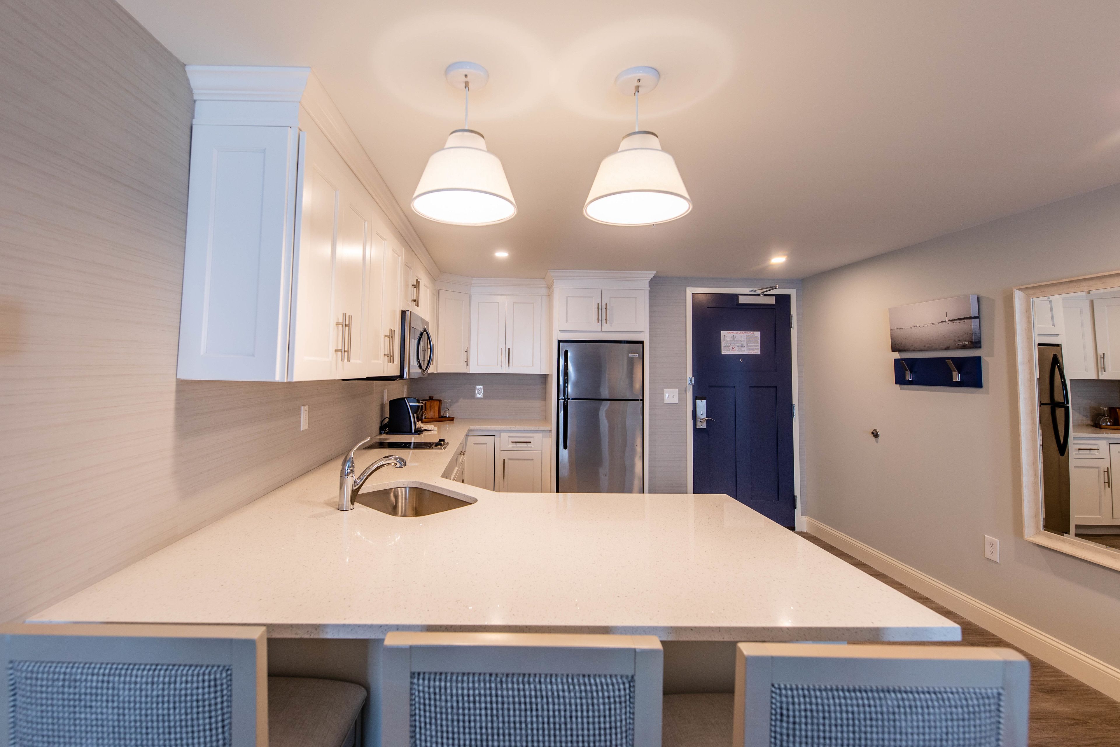 full-sized fridge, microwave, stovetop, dishwasher