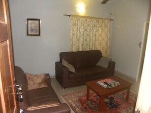 Suite Executive | Soggiorno | TV a schermo piatto
