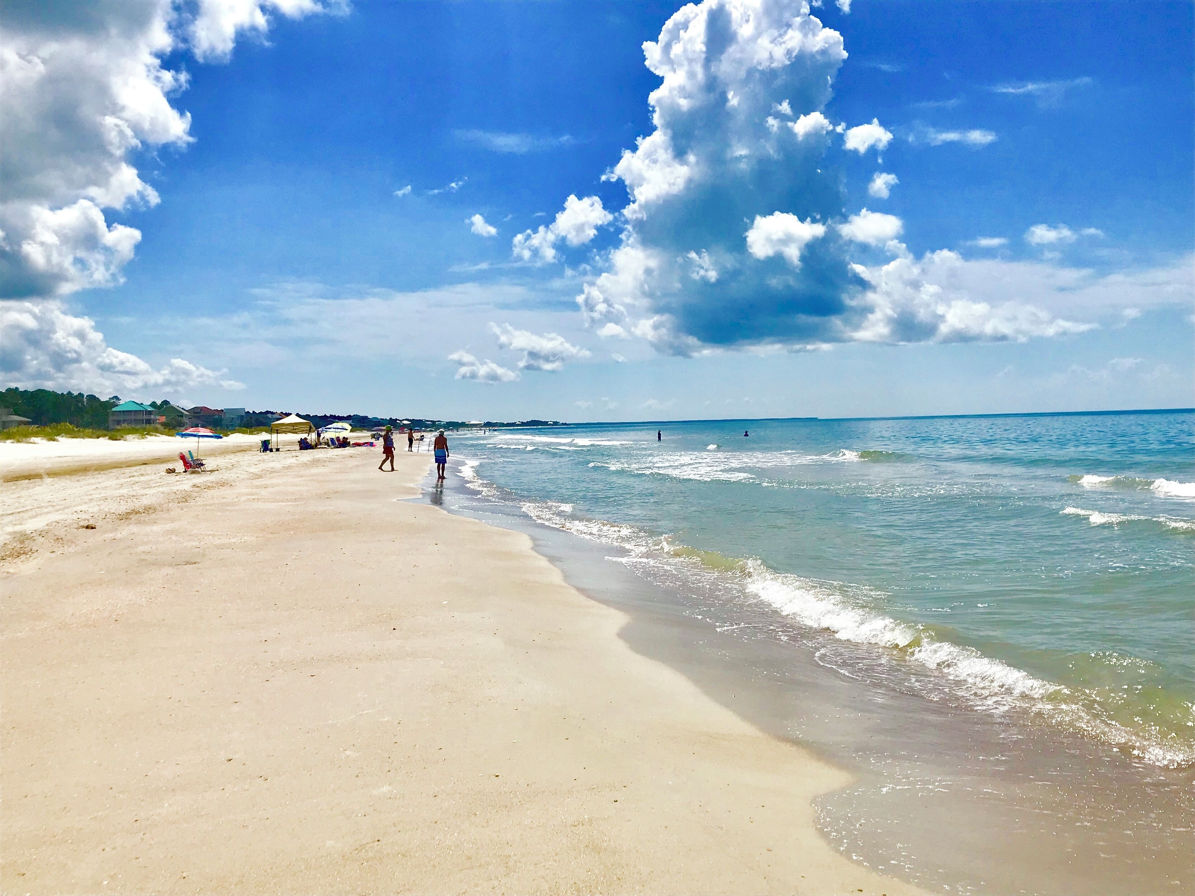 On the beach, sun loungers, beach towels
