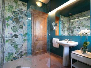 Shower, eco-friendly toiletries, hair dryer, bidet