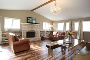 Superior Cottage, 2 Queen Beds | Living area | Netflix, pay movies