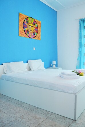 ベーシック ダブルルーム ガーデンビュー | セーフティボックス (室内)、WiFi (無料)、ベッドシーツ