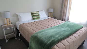One Bedroom Unit | Iron/ironing board, free cribs/infant beds, free WiFi, bed sheets