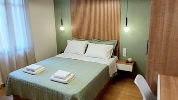 Suite Comfort | Tirai kedap cahaya, setrika/meja setrika, Wi-Fi gratis, dan seprai linen