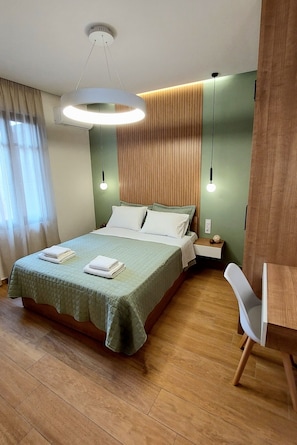 Suite Confort | Rideaux dâobscurcissement, fer et planche Ă repasser