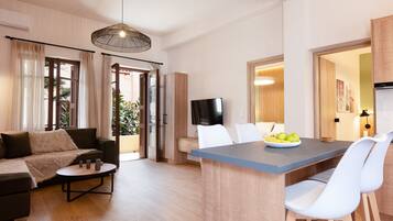 Suite Comfort | Area keluarga | TV layar datar