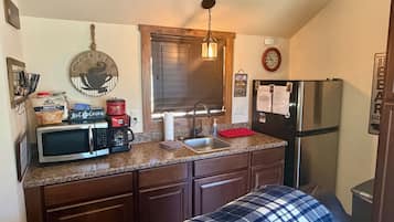 Fridge, microwave, coffee/tea maker, toaster
