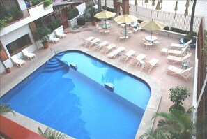 Large Pool with Deck with lounges, tables & chairs