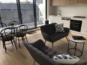 Apartment, 2 Bedrooms | Living area | Flat-screen TV