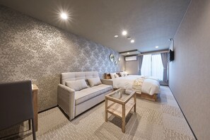 ดีลักซ์อพาร์ทเมนท์ | โต๊ะทำงาน, ผ้าม่านกันแสง, Wi-Fi ฟรี, ผ้าปูที่นอน