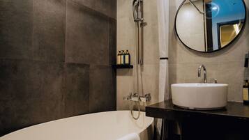 Designer toiletries, hair dryer, bathrobes, slippers