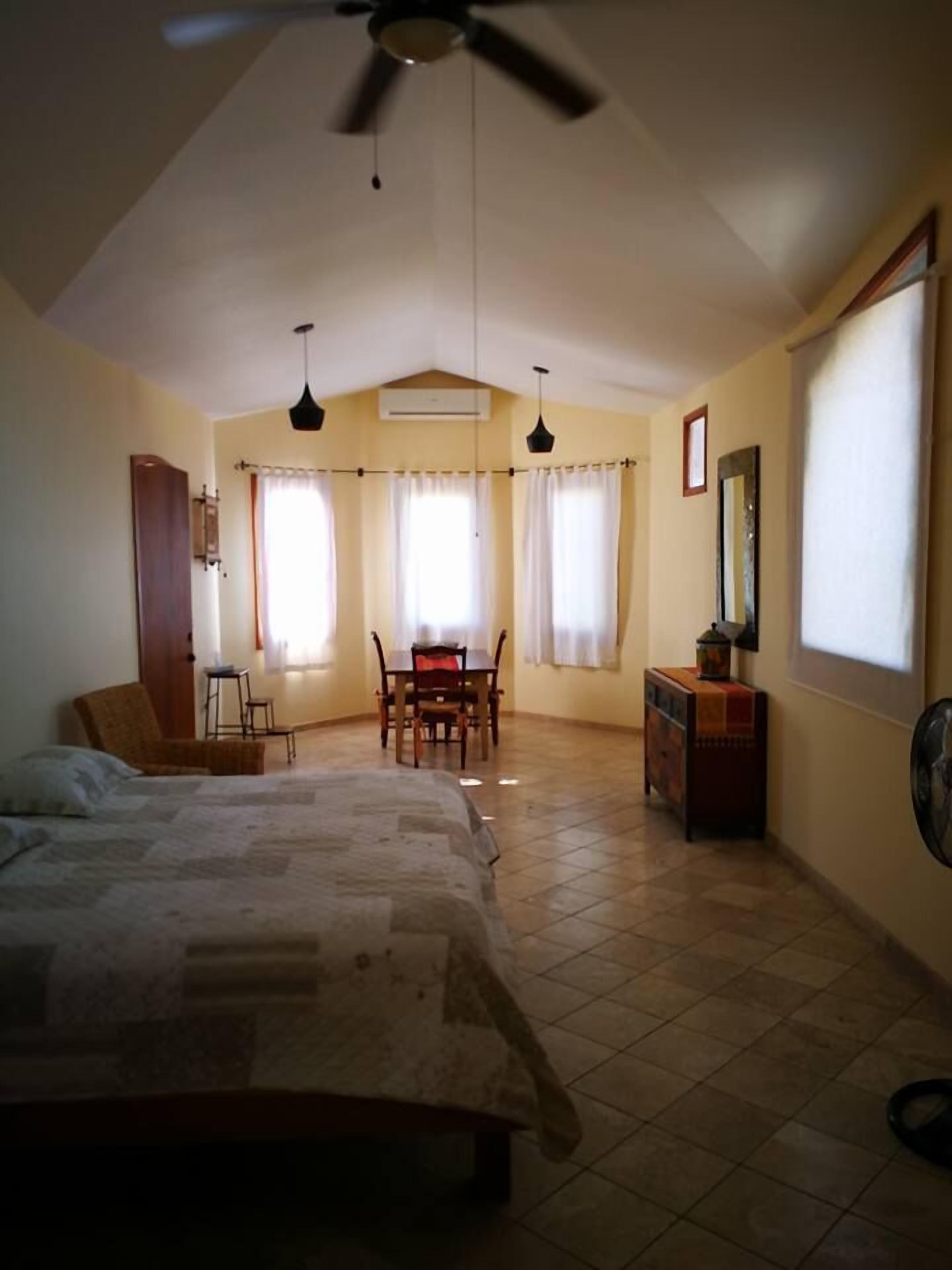 standard room, 2 queen beds, refrigerator, courtyard view | 1 bedroom, premium bedding, down duvets, pillow-top beds