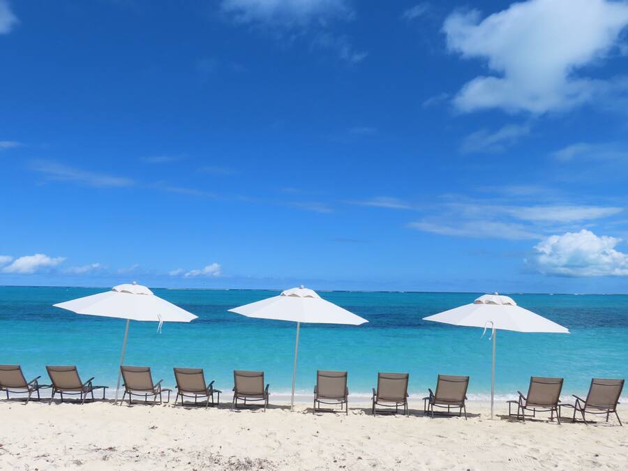 Beach nearby, white sand, sun loungers, beach umbrellas