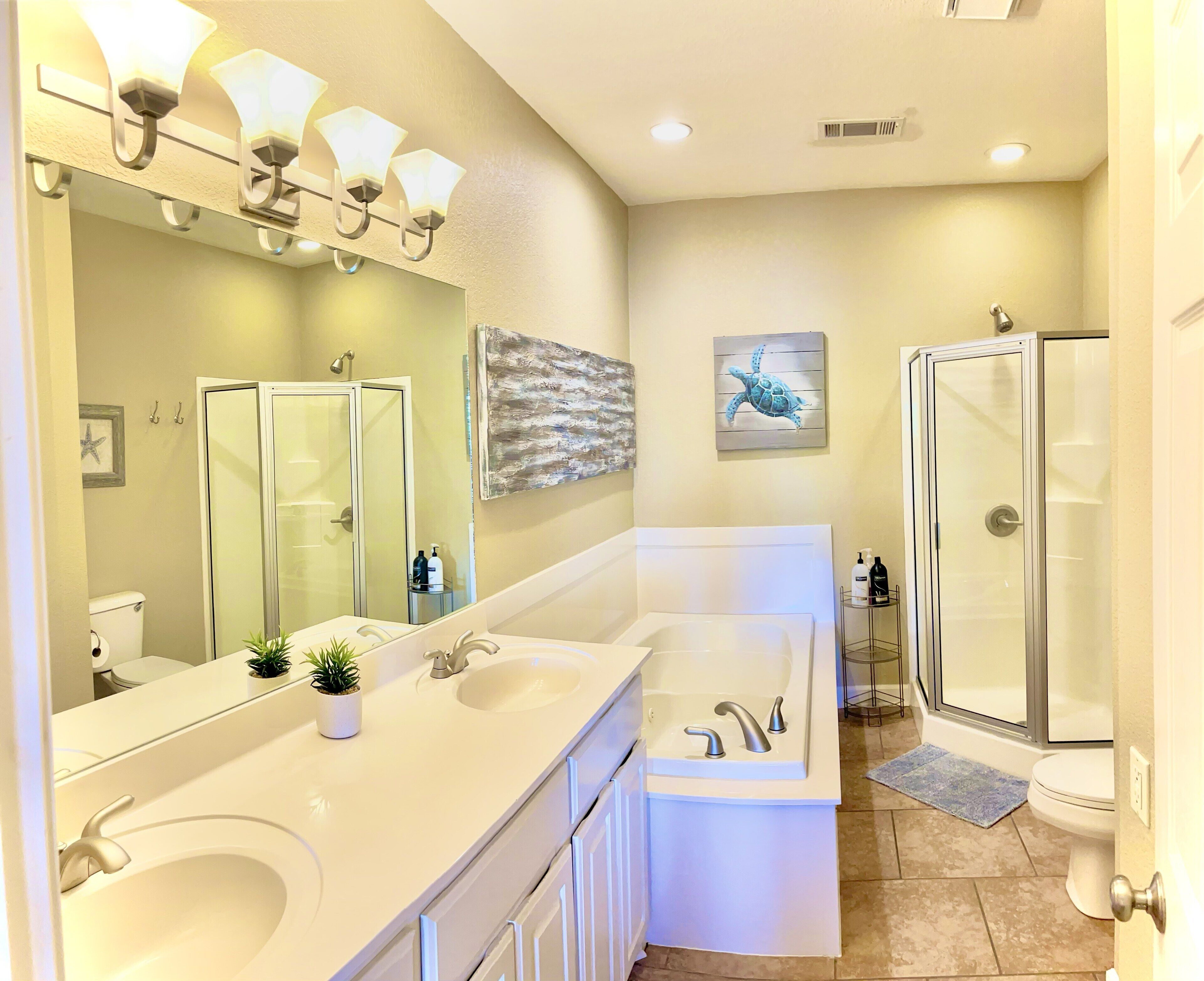 Shower, jetted tub, hair dryer, towels