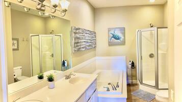 Shower, jetted tub, hair dryer, towels