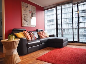 Apartment, 2 Queen Beds, Garden View | Living area | Flat-screen TV
