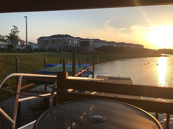 Enjoy a serene riverside view from the deck, where you can sit and take in the peaceful atmosphere.