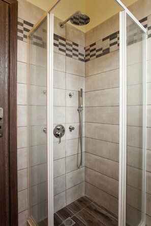 Hair dryer, towels, soap, shampoo