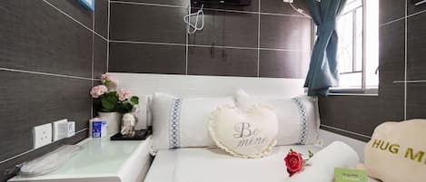 Blackout curtains, iron/ironing board, bed sheets