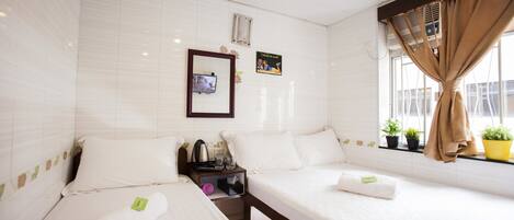 Blackout curtains, iron/ironing board, bed sheets