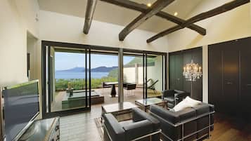 Japanese Western Style Room with Private Open-air Bath, Ocean View | Living area | Flat-screen TV