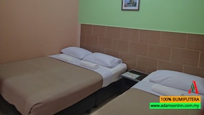 Standard Triple Room, Multiple Beds, No Windows | Living area | Flat-screen TV