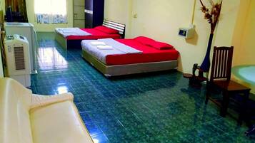 Family Suite | Minibar, in-room safe, desk, blackout drapes