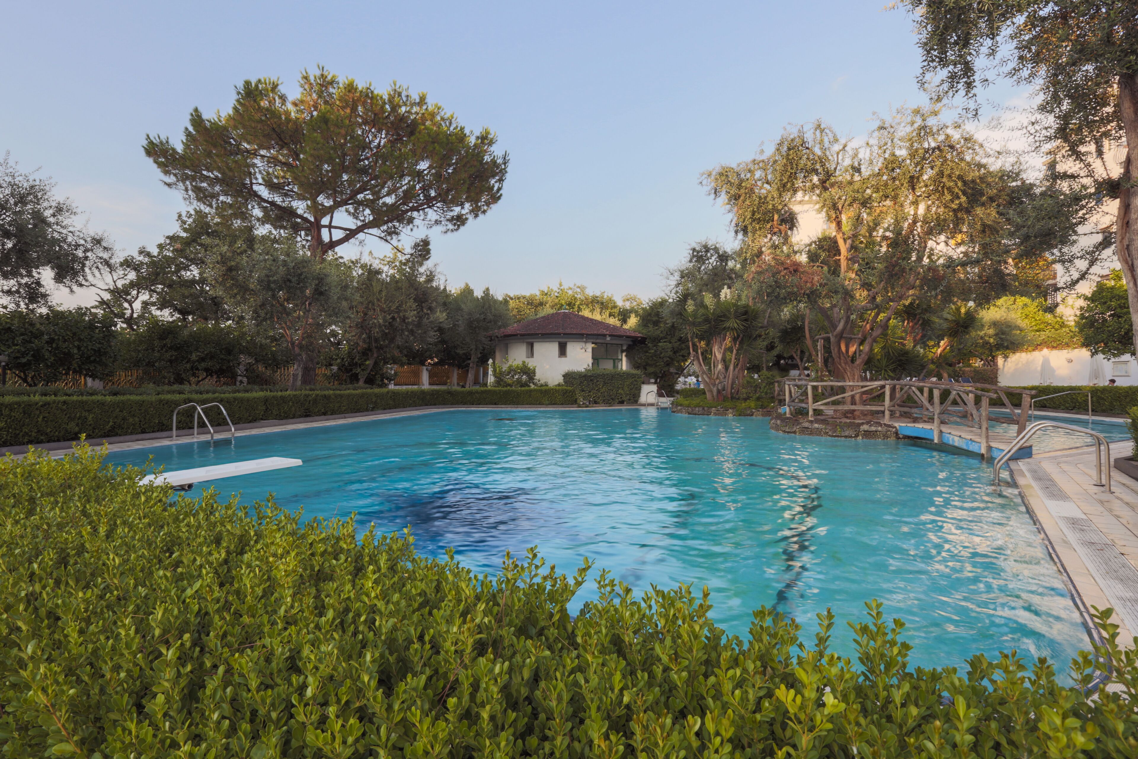Seasonal outdoor pool, pool loungers