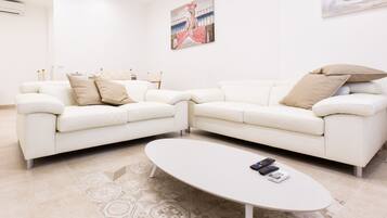 Apartment, 2 Bedrooms | Living area | Flat-screen TV