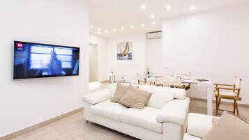Apartment, 2 Bedrooms | Living area | Flat-screen TV
