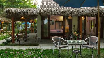 Deluxe Double Room, Garden View | Terrace/patio