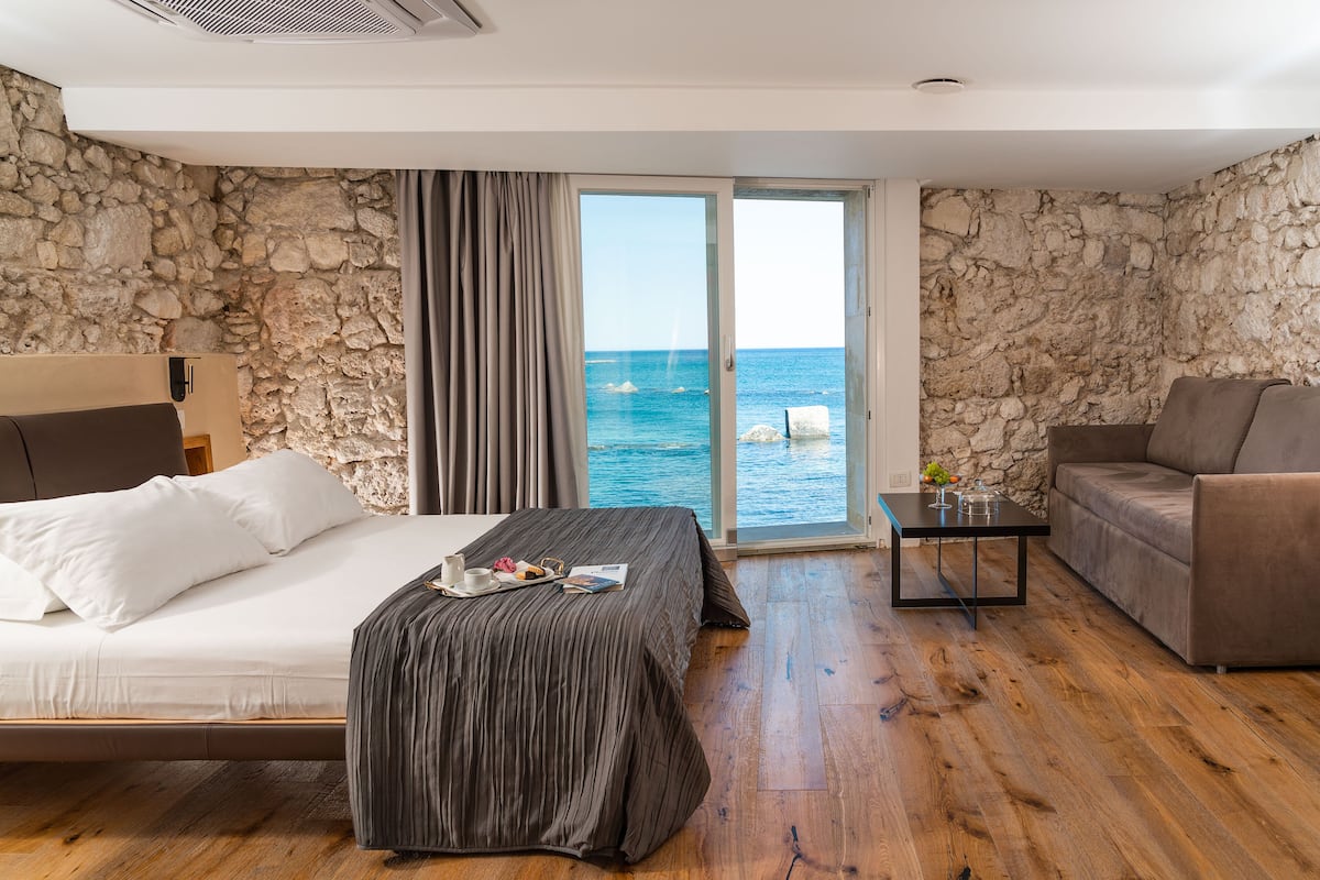 Junior Suite, Non Smoking, Sea View | 1 bedroom, down comforters, minibar, in-room safe