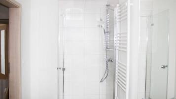 Hair dryer, towels, soap, shampoo