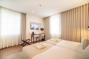 Standard Double Room, 2 Twin Beds | Minibar, in-room safe, desk, blackout drapes