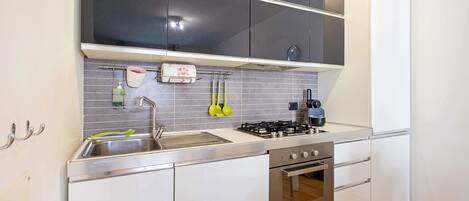 Apartment, 1 Bedroom | Private kitchen | Full-size fridge, oven, stovetop, dishwasher