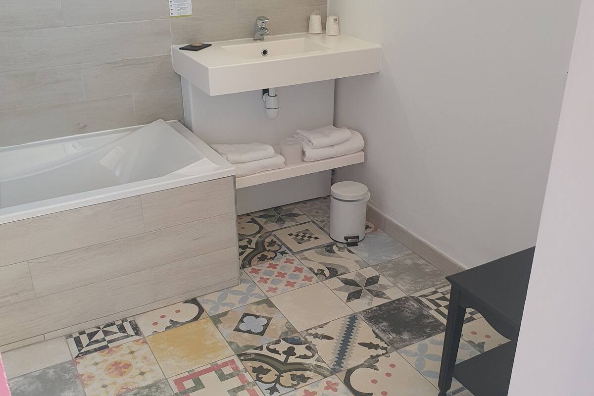 superior double room | bathroom | free toiletries, hair dryer, towels