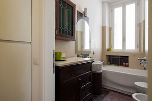 Apartment, 1 Bedroom | Bathroom | Separate bathtub and shower, jetted bath, rainfall showerhead