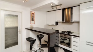 อพาร์ทเมนท์, 1 ห้องนอน, วิวสวน | ครัวส่วนตัว | เครื่องชงกาแฟเอสเปรสโซ, เครื่องชงกาแฟ/ชา, ตู้เย็น, ไมโครเวฟ