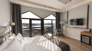 Quarto luxo, terraço | Roupas de cama premium, frigobar, cofres nos quartos