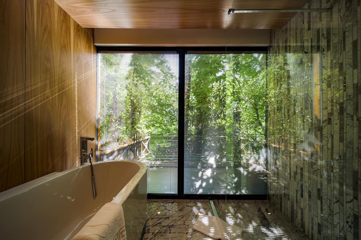 junior suite, 1 double bed with sofa bed, non smoking, sea view | bathroom | shower, rainfall showerhead, free toiletries, hair dryer