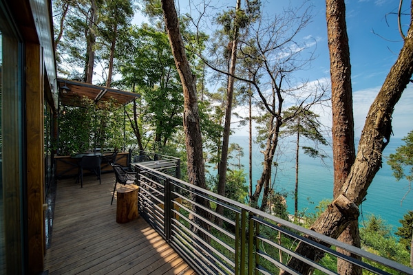 Suite Deluks, Beberapa Tempat Tidur, Bebas Asap Rokok, pemandangan laut | Seprai premium, minibar, brankas, dan ruang kerja ramah laptop