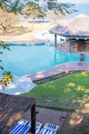 Outdoor pool, open 7:00 AM to 9:00 PM, sun loungers