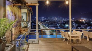 Outdoor pool, open 6:00 AM to 10:00 PM, sun loungers