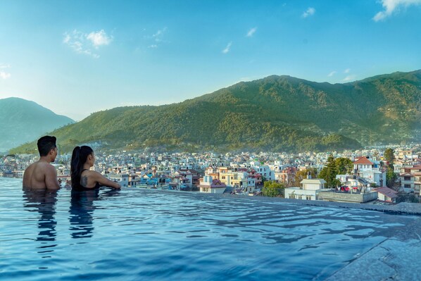 Outdoor pool, open 6:00 AM to 10:00 PM, pool loungers - Hotel Sabrina Kathmandu (Burhanilkantha)