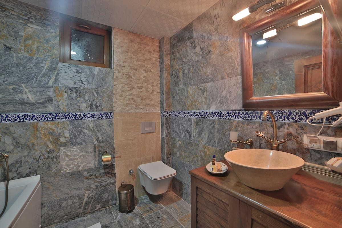 comfort double room, valley view | bathroom | designer toiletries, hair dryer, slippers, bidet
