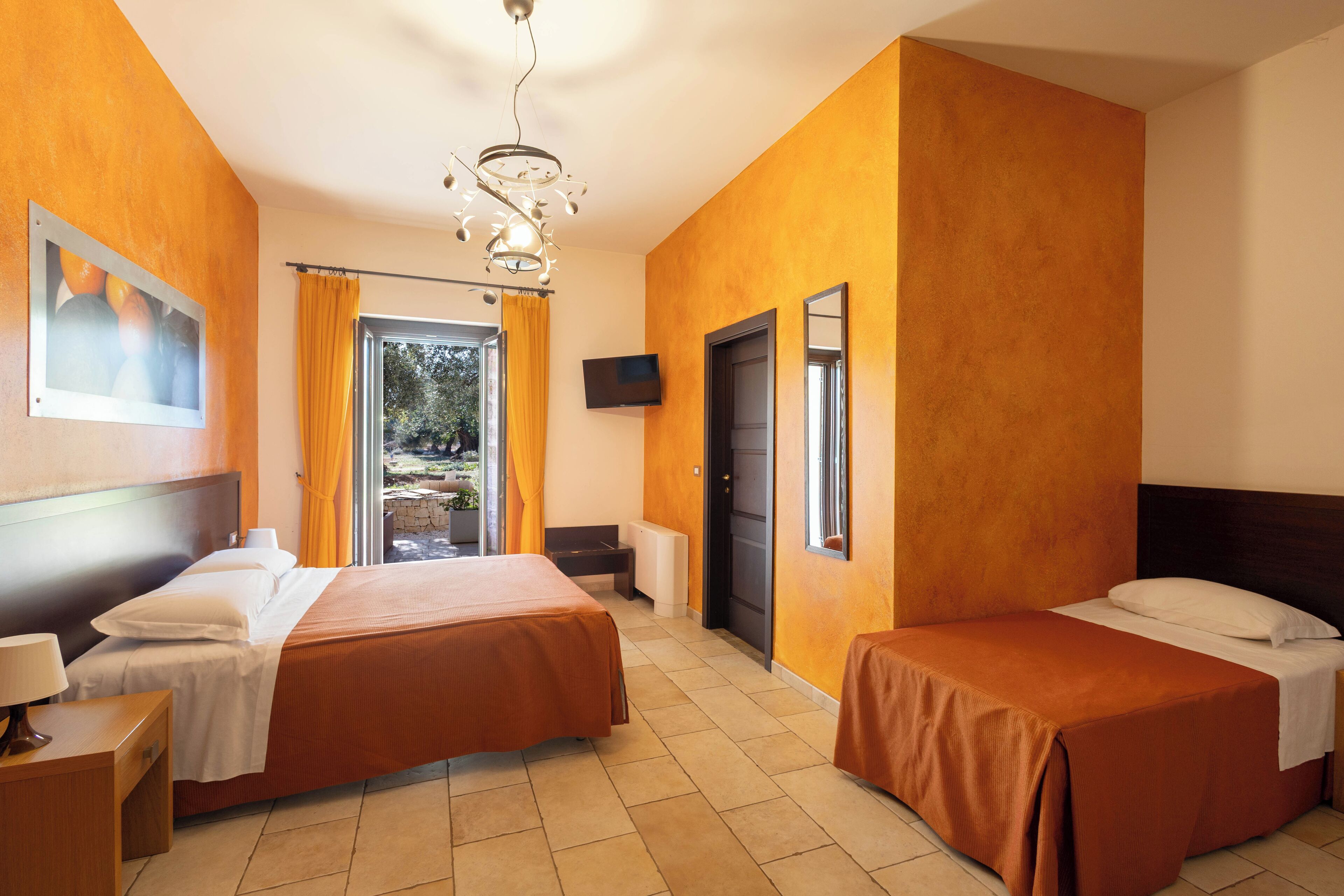 Triple Room, Multiple Beds, Private Bathroom, Garden View | Minibar, desk, blackout drapes, free WiFi