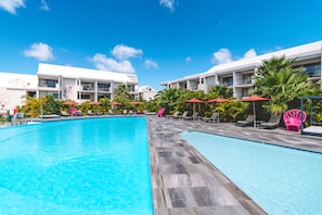 2 outdoor pools, pool umbrellas, sun loungers