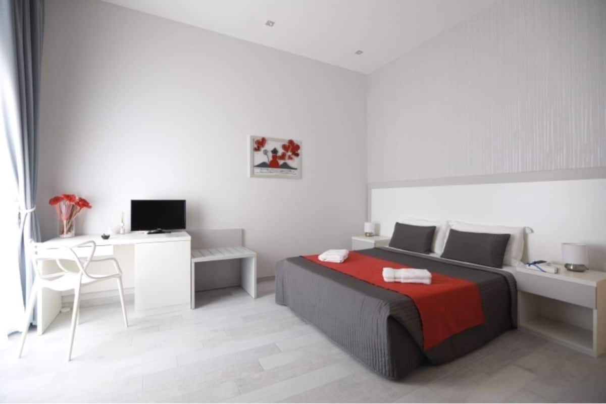 Suite, 1 cama Queen size y sofá cama | 1 habitación, escritorio, cortinas blackout y insonorización