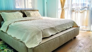 Departamento Deluxe, 1 cama Queen size, vista a la ciudad | Camas extra