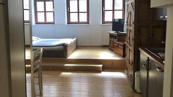 Comfort Apartment, City View | Living area | Flat-screen TV, DVD player